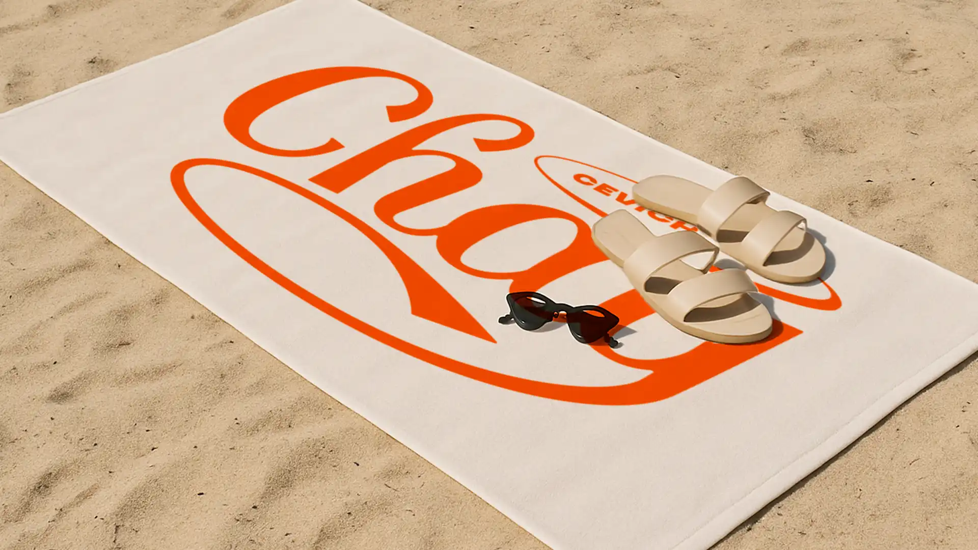 Chay wordmark applied on a beach towel